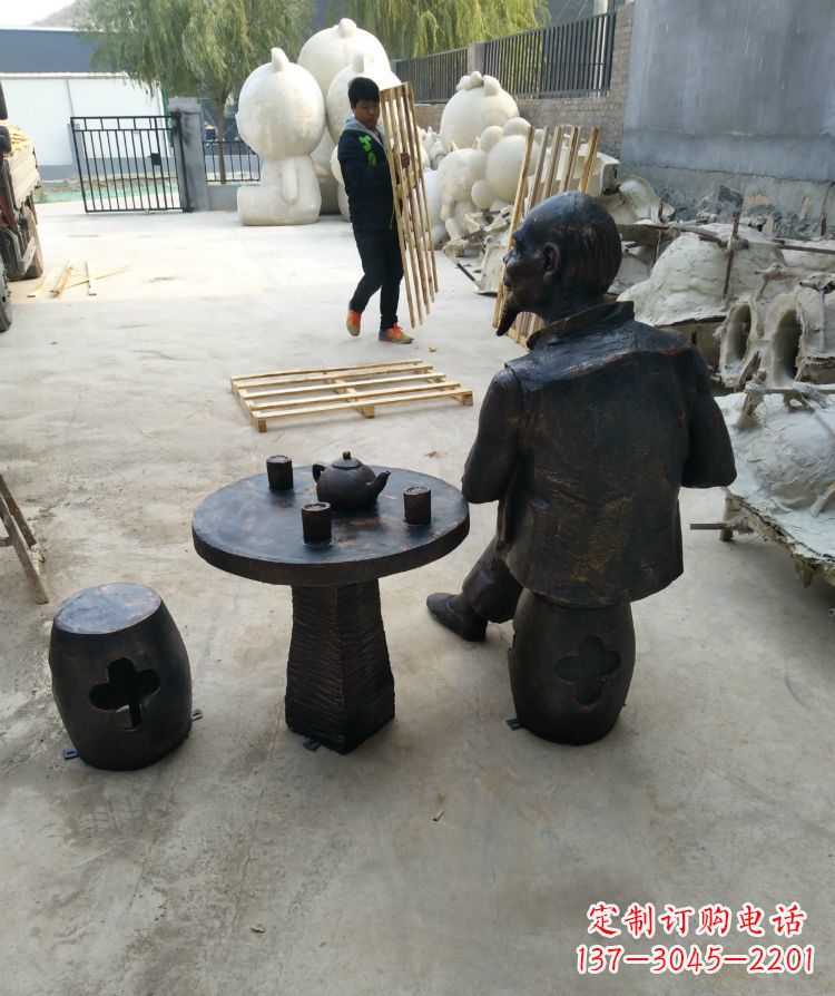 温州公园喝茶的老人铜雕