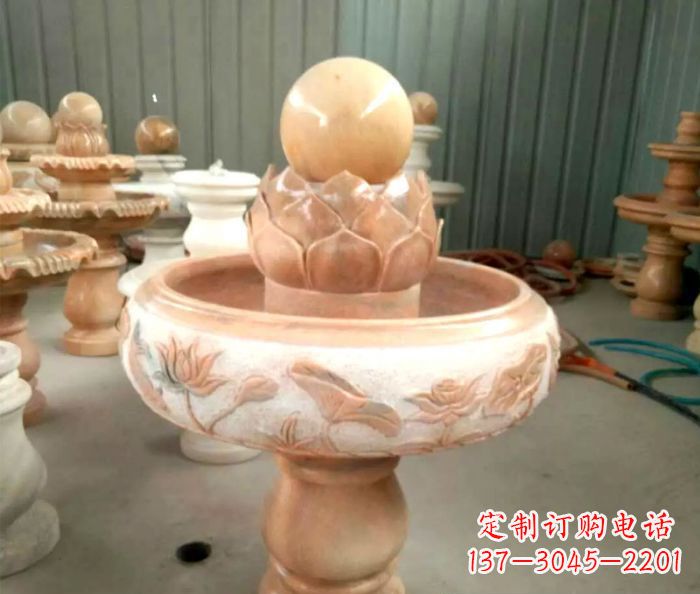 温州石来运转晚霞红风水球喷泉石雕