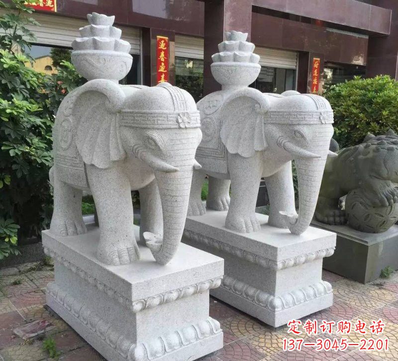 温州驮元宝的大象石雕