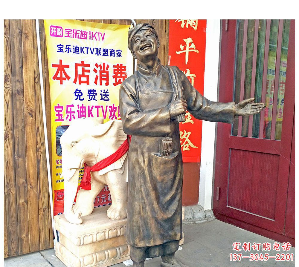温州迎宾的店小二铜雕